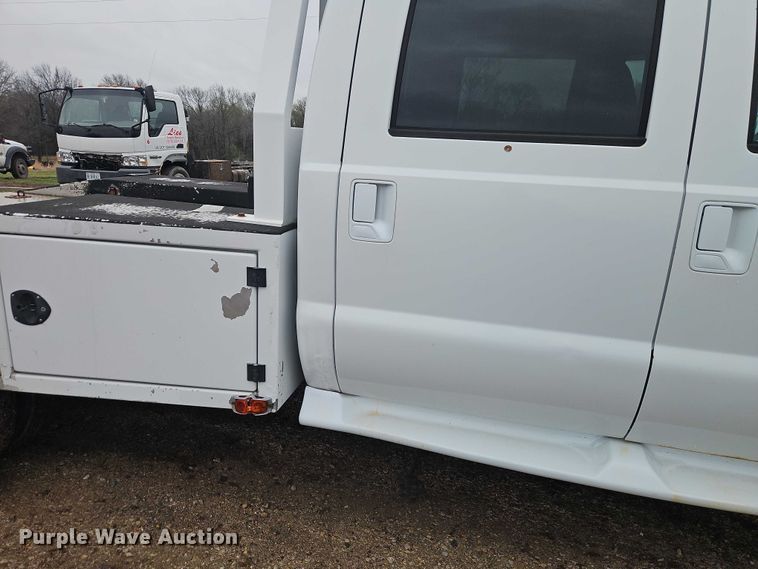 image for item EO7195 2006 Ford F550 Crew Cab flatbed truck