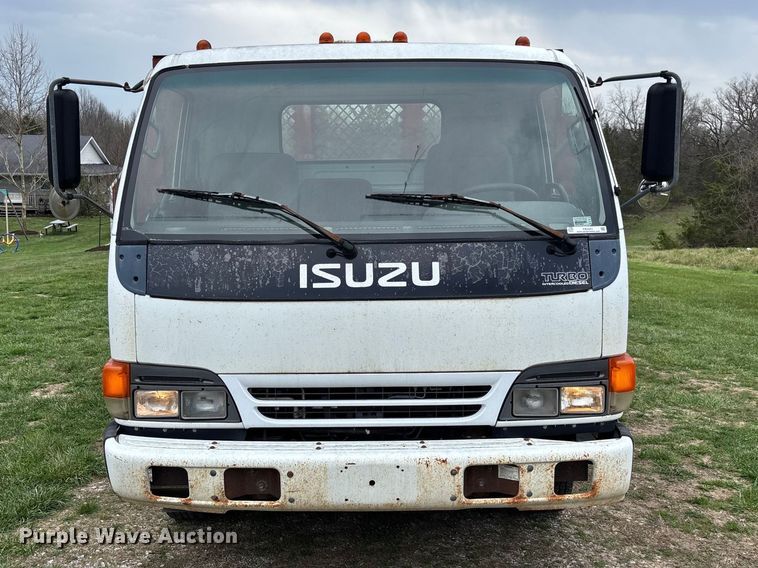 image for item FB3343 1999 Isuzu NPR dump flatbed truck