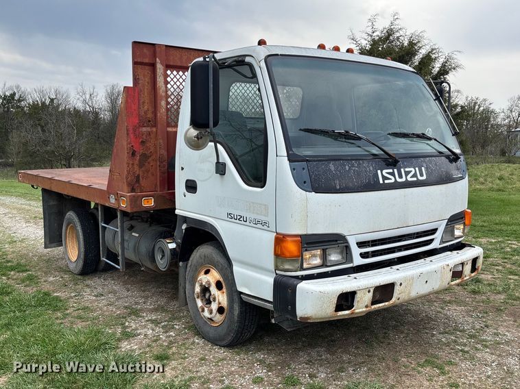 image for item FB3343 1999 Isuzu NPR dump flatbed truck