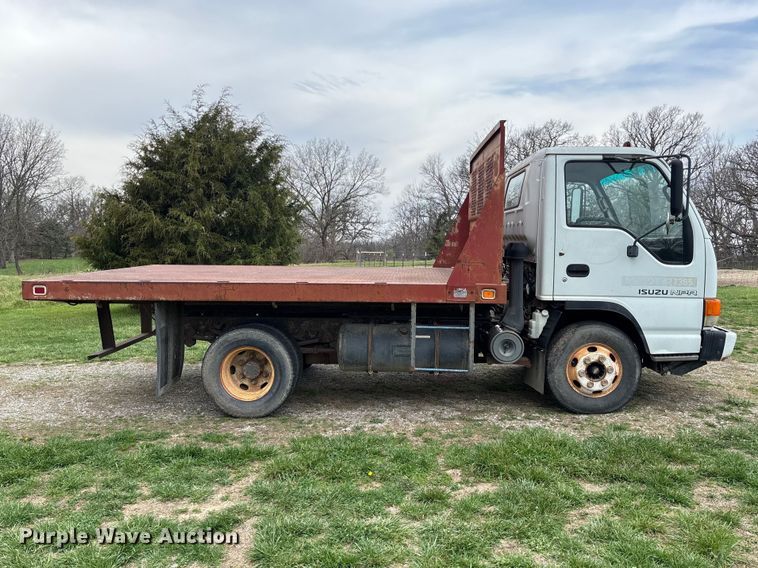 image for item FB3343 1999 Isuzu NPR dump flatbed truck