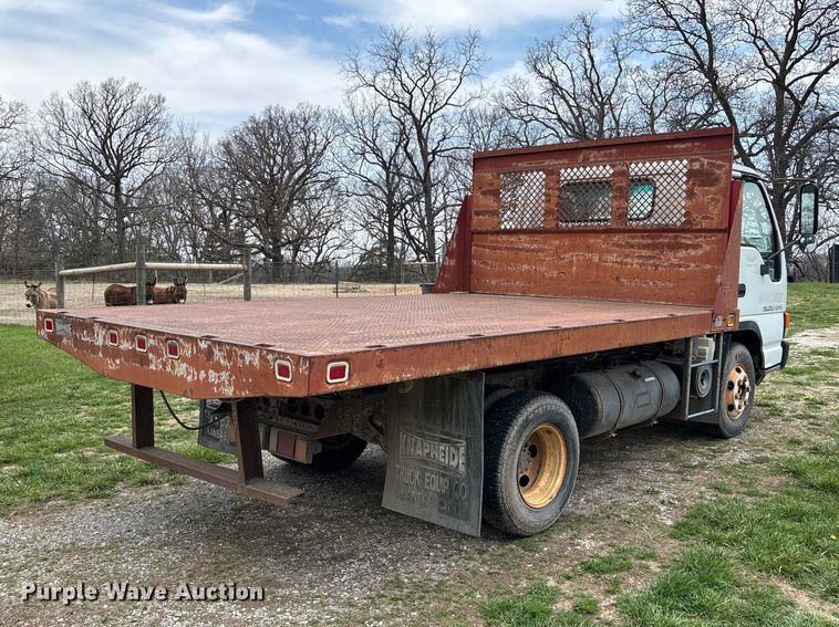 image for item FB3343 1999 Isuzu NPR dump flatbed truck