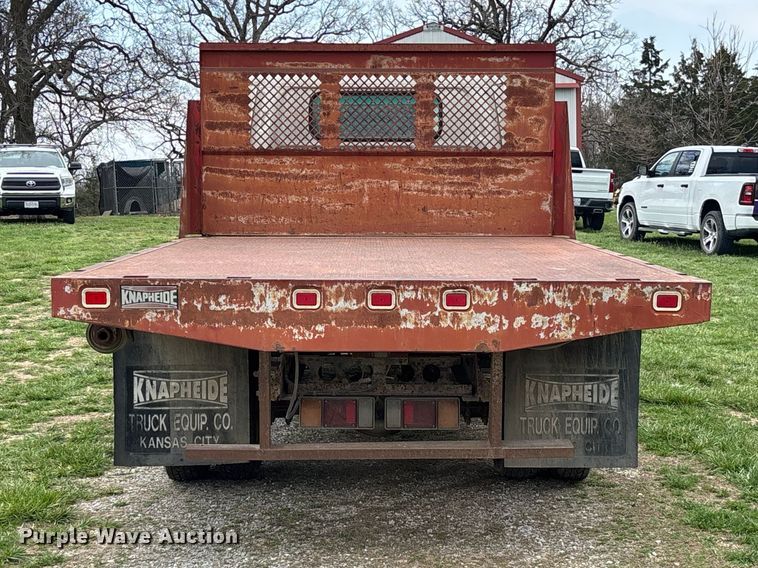 image for item FB3343 1999 Isuzu NPR dump flatbed truck