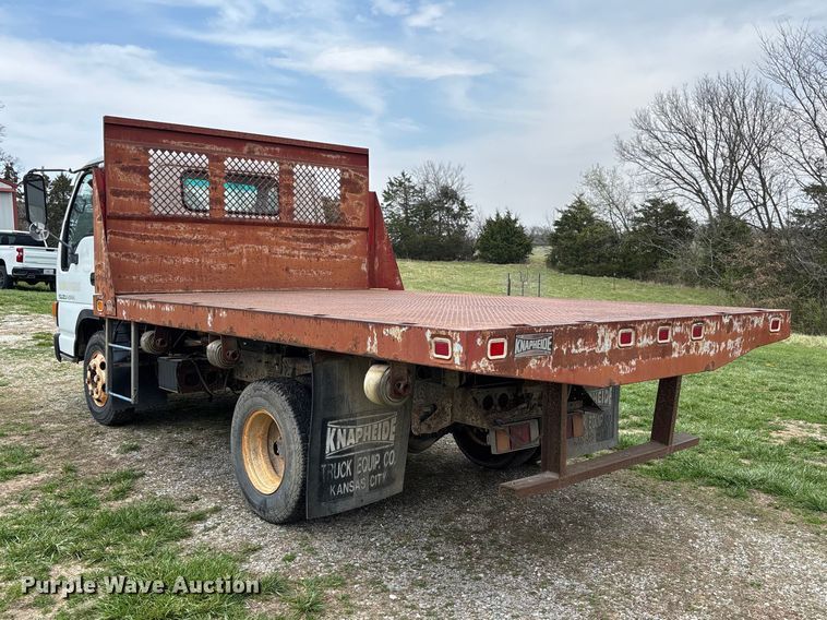 image for item FB3343 1999 Isuzu NPR dump flatbed truck