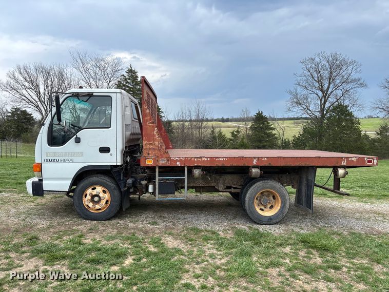 image for item FB3343 1999 Isuzu NPR dump flatbed truck