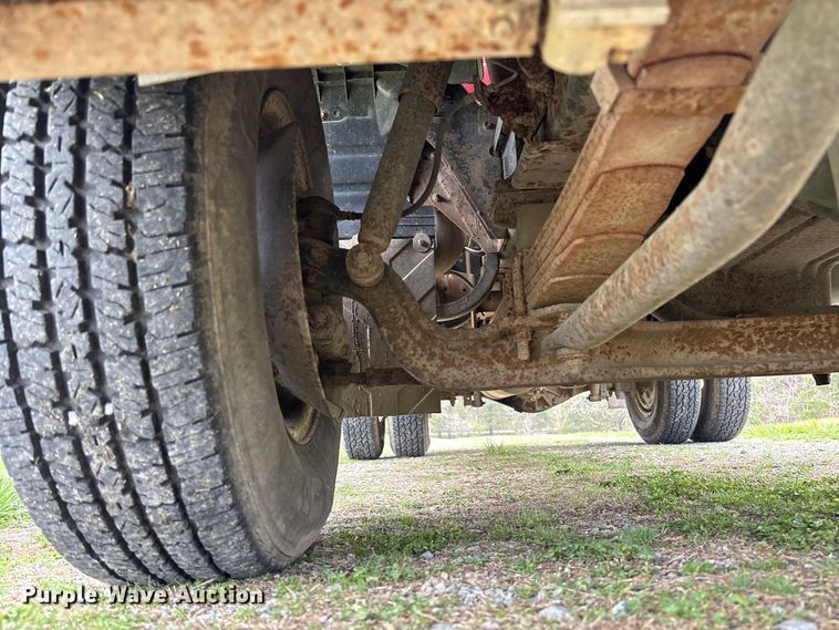 image for item FB3343 1999 Isuzu NPR dump flatbed truck