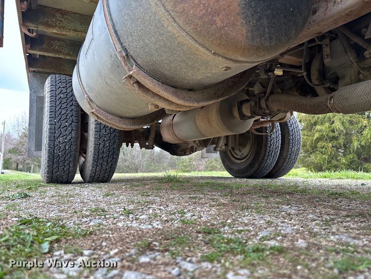 image for item FB3343 1999 Isuzu NPR dump flatbed truck