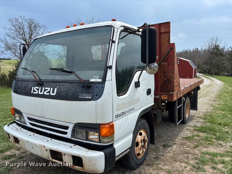 image for item FB3343 1999 Isuzu NPR dump flatbed truck
