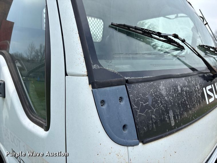 image for item FB3343 1999 Isuzu NPR dump flatbed truck