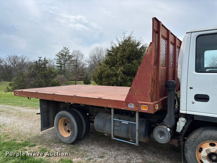 image for item FB3343 1999 Isuzu NPR dump flatbed truck