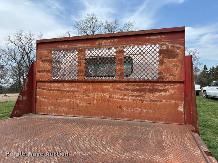 image for item FB3343 1999 Isuzu NPR dump flatbed truck