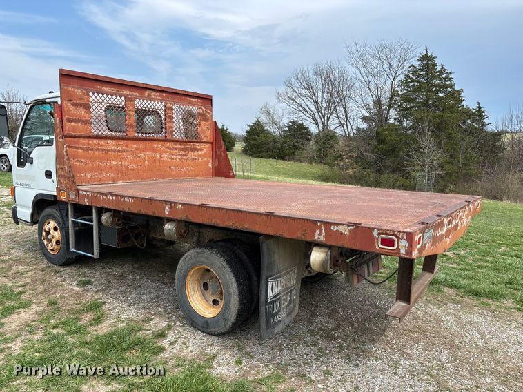 image for item FB3343 1999 Isuzu NPR dump flatbed truck