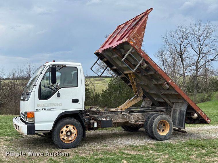 image for item FB3343 1999 Isuzu NPR dump flatbed truck
