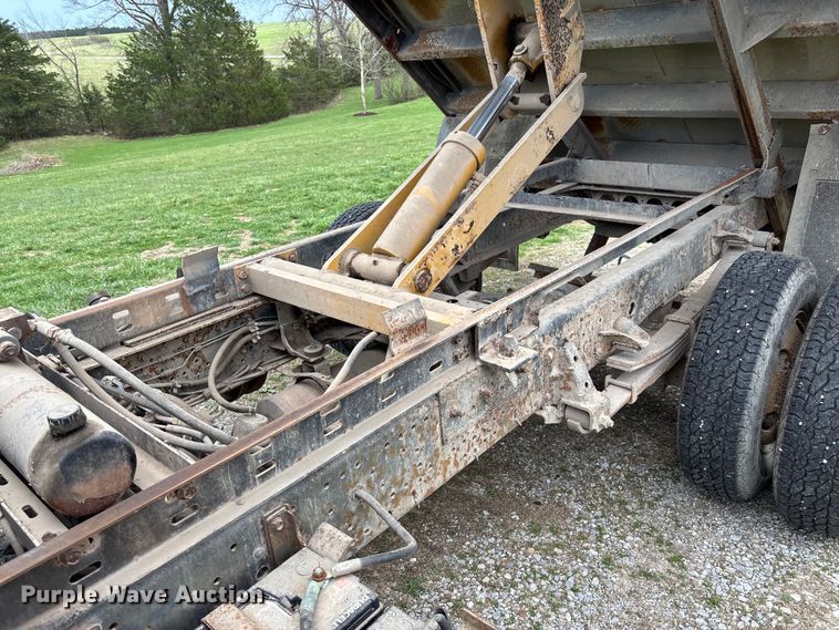 image for item FB3343 1999 Isuzu NPR dump flatbed truck