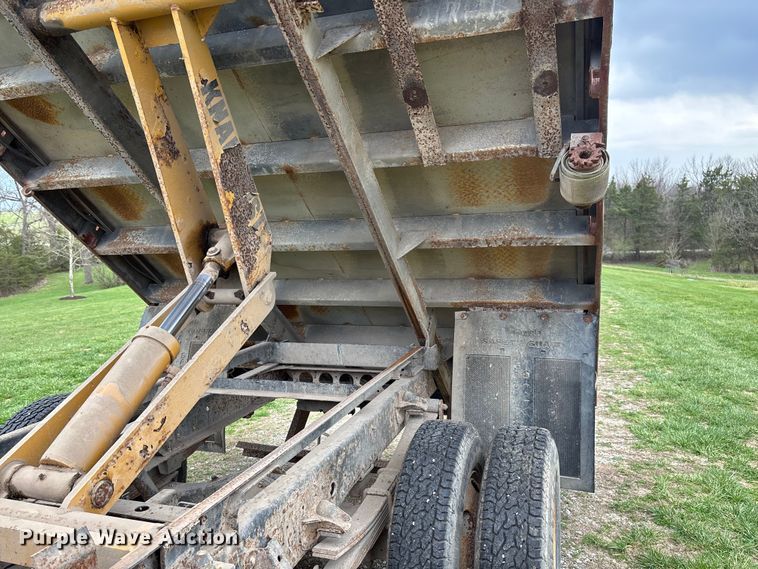 image for item FB3343 1999 Isuzu NPR dump flatbed truck