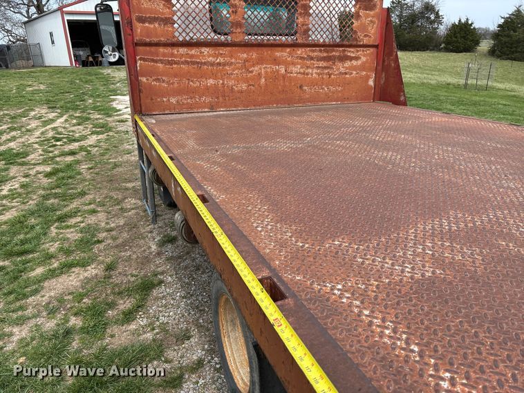 image for item FB3343 1999 Isuzu NPR dump flatbed truck