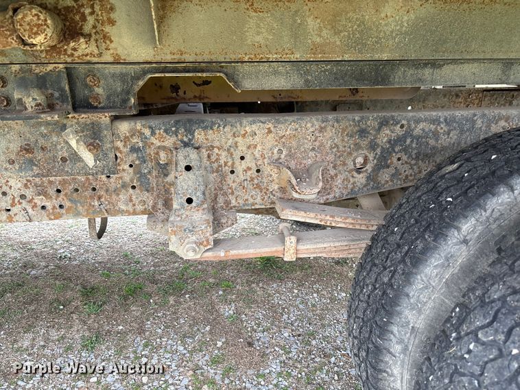 image for item FB3343 1999 Isuzu NPR dump flatbed truck