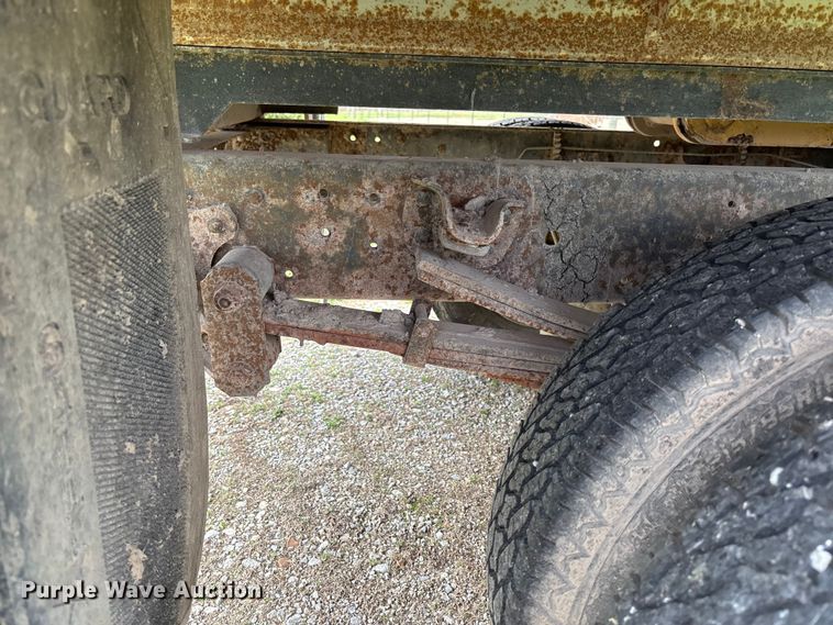 image for item FB3343 1999 Isuzu NPR dump flatbed truck