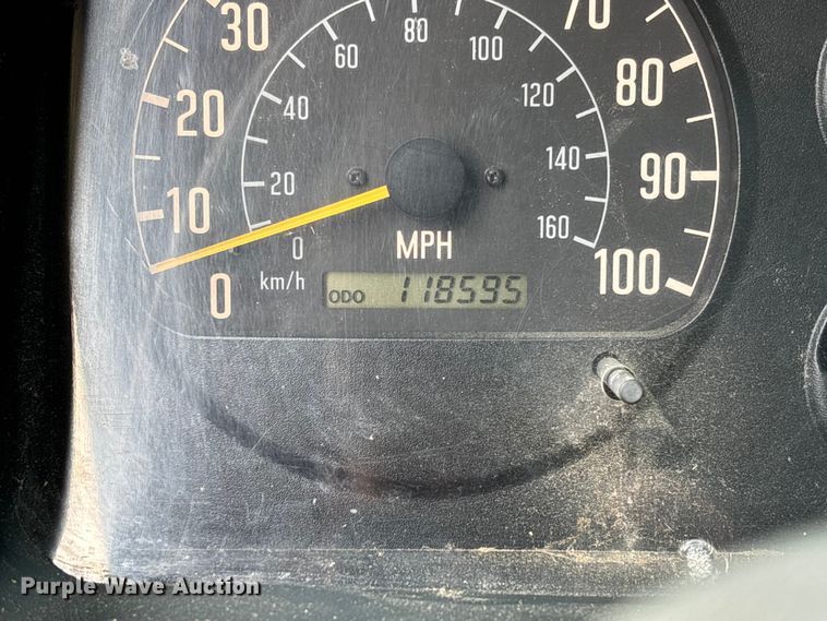 image for item FB3343 1999 Isuzu NPR dump flatbed truck