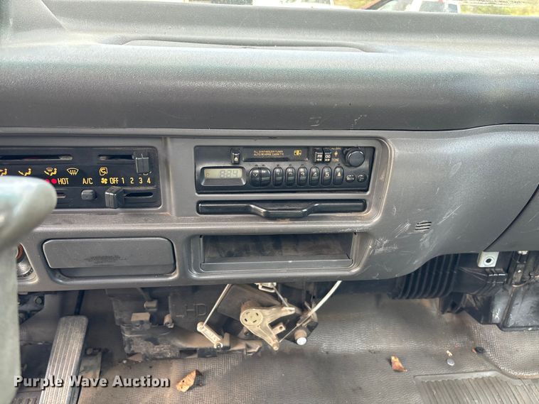 image for item FB3343 1999 Isuzu NPR dump flatbed truck