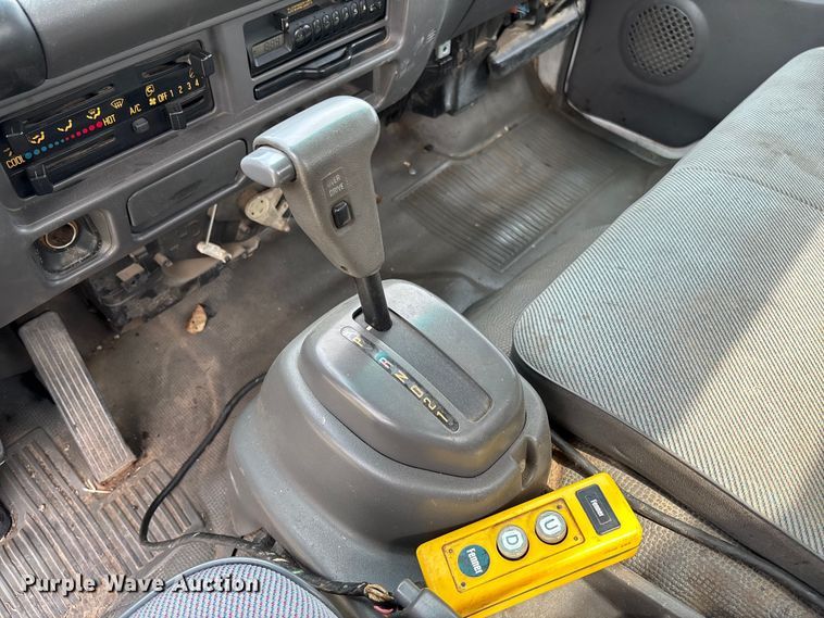 image for item FB3343 1999 Isuzu NPR dump flatbed truck