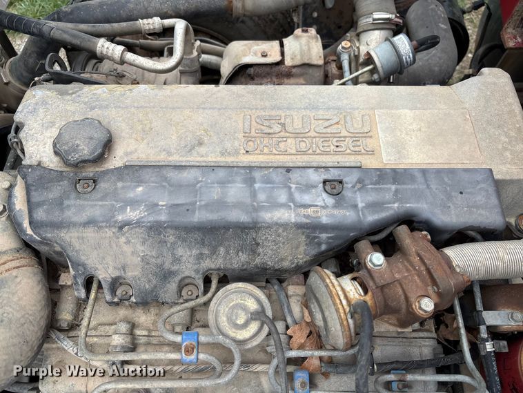 image for item FB3343 1999 Isuzu NPR dump flatbed truck