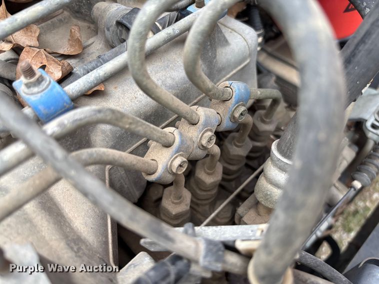 image for item FB3343 1999 Isuzu NPR dump flatbed truck