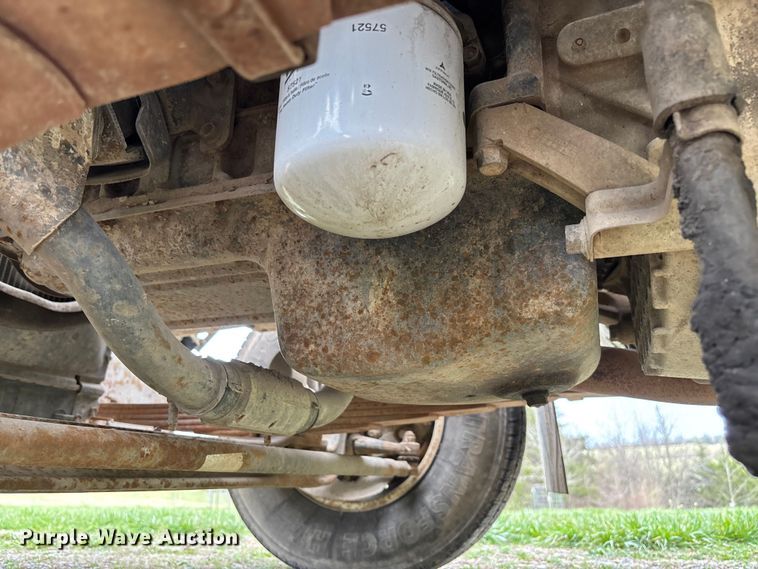 image for item FB3343 1999 Isuzu NPR dump flatbed truck