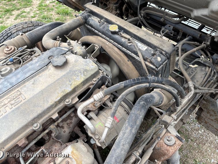 image for item FB3343 1999 Isuzu NPR dump flatbed truck