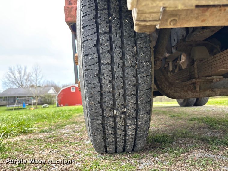 image for item FB3343 1999 Isuzu NPR dump flatbed truck