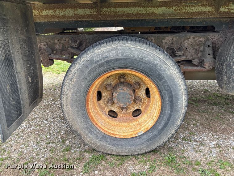 image for item FB3343 1999 Isuzu NPR dump flatbed truck