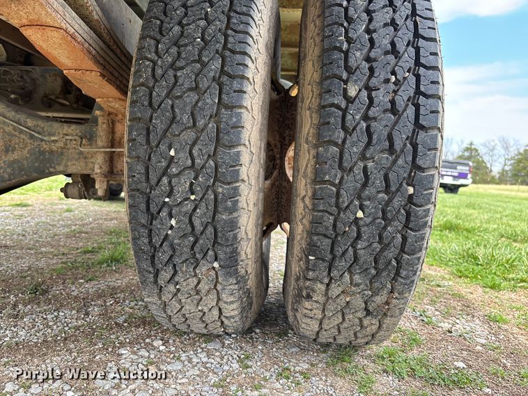 image for item FB3343 1999 Isuzu NPR dump flatbed truck