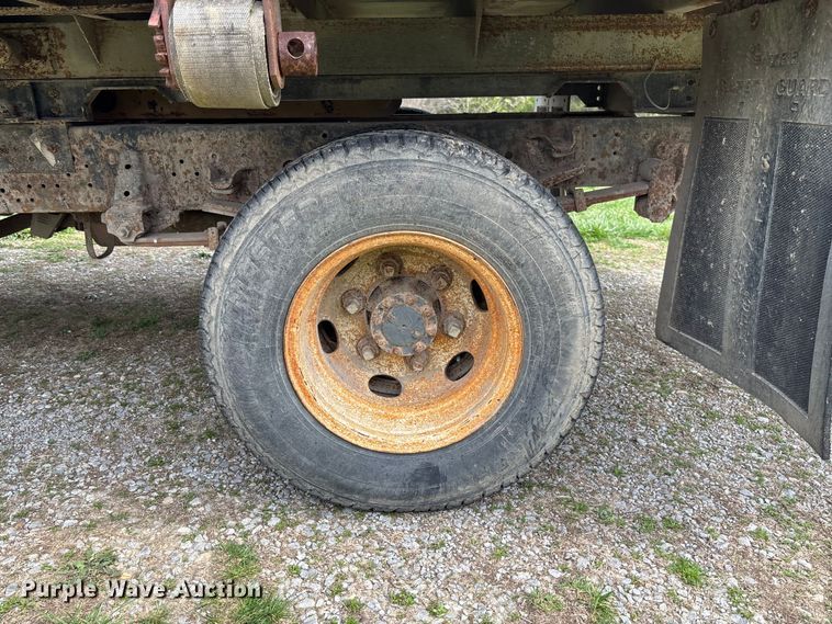 image for item FB3343 1999 Isuzu NPR dump flatbed truck