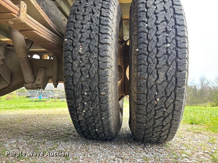 image for item FB3343 1999 Isuzu NPR dump flatbed truck