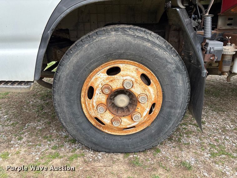 image for item FB3343 1999 Isuzu NPR dump flatbed truck