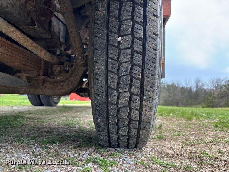 image for item FB3343 1999 Isuzu NPR dump flatbed truck