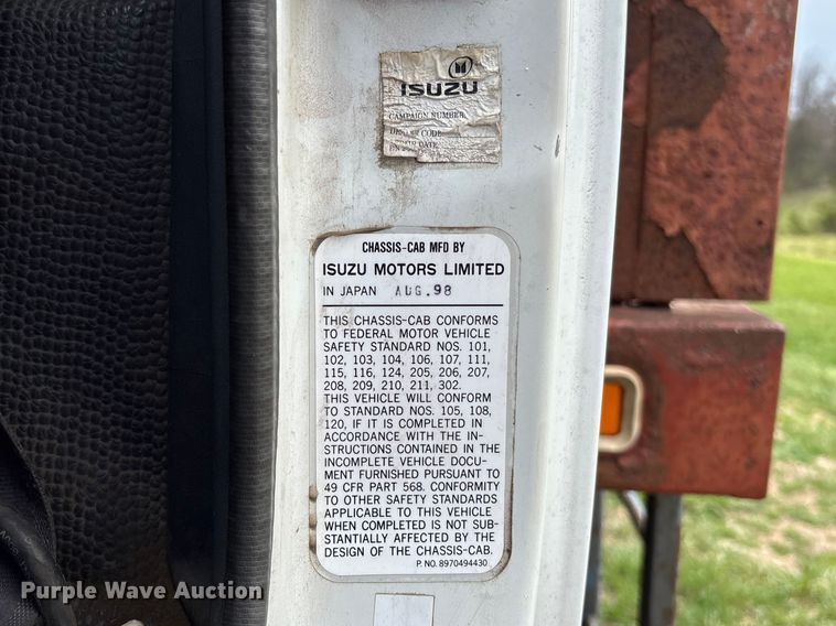 image for item FB3343 1999 Isuzu NPR dump flatbed truck