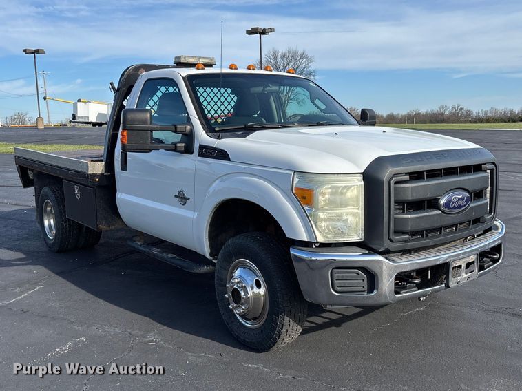 image for item FB3391 2012 Ford F350 Super Duty flatbed pickup truck