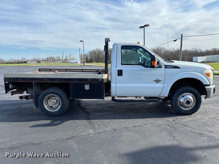 image for item FB3391 2012 Ford F350 Super Duty flatbed pickup truck