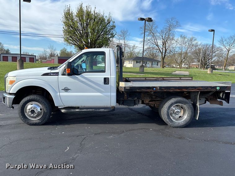image for item FB3391 2012 Ford F350 Super Duty flatbed pickup truck