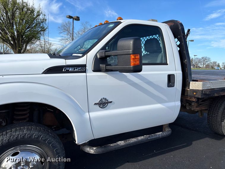 image for item FB3391 2012 Ford F350 Super Duty flatbed pickup truck