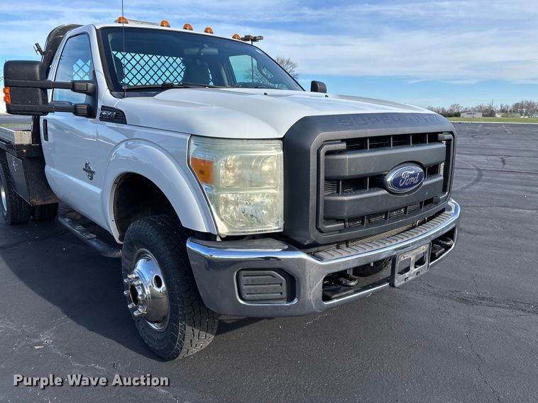 image for item FB3391 2012 Ford F350 Super Duty flatbed pickup truck