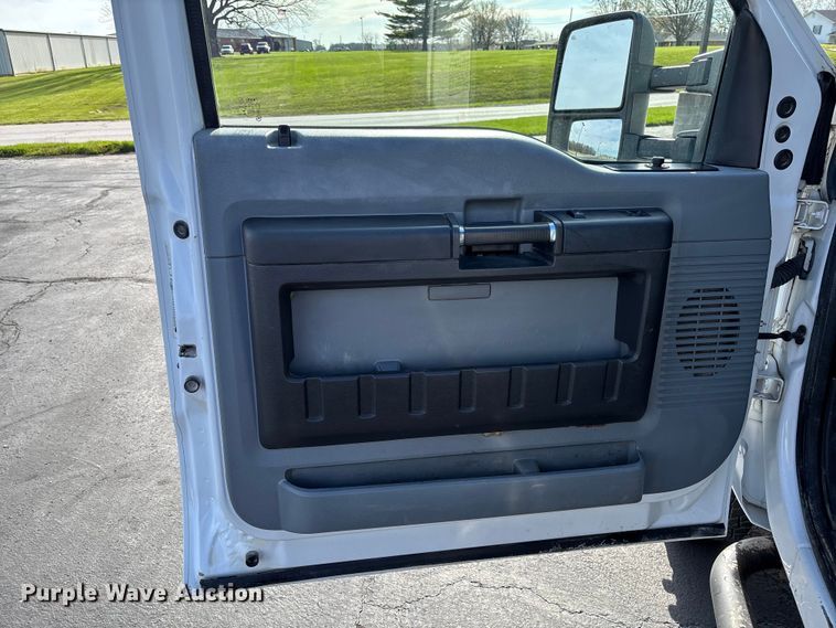 image for item FB3391 2012 Ford F350 Super Duty flatbed pickup truck