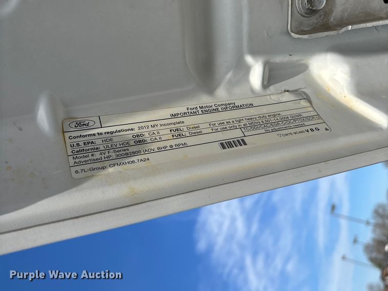 image for item FB3391 2012 Ford F350 Super Duty flatbed pickup truck