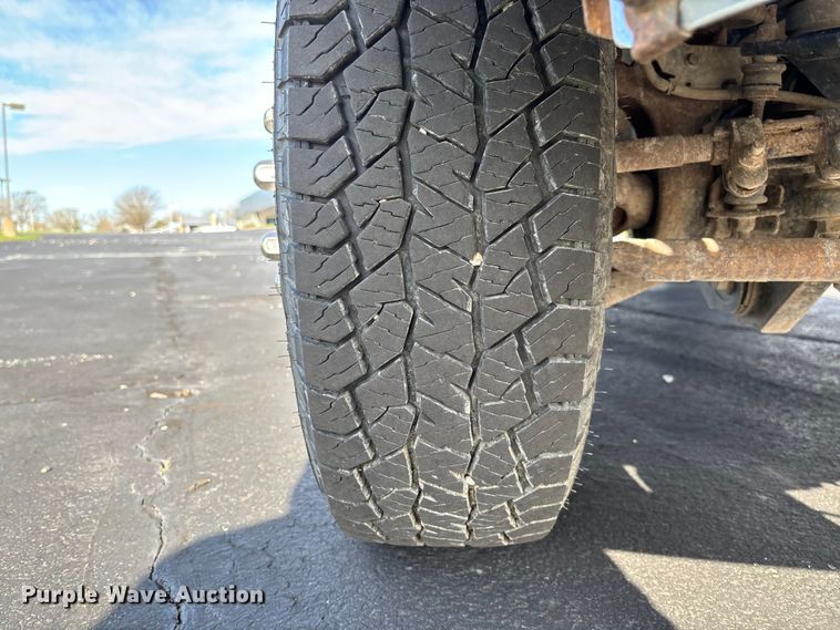 image for item FB3391 2012 Ford F350 Super Duty flatbed pickup truck