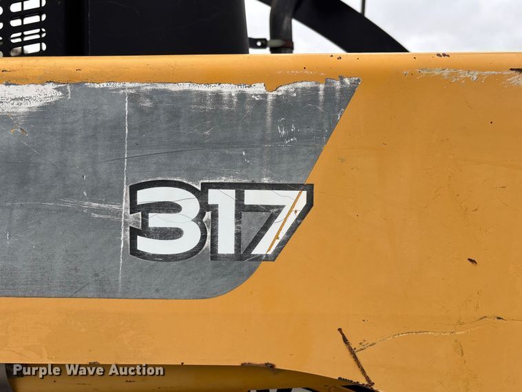 image for item FC4581 2005 John deere 317 skid steer loader