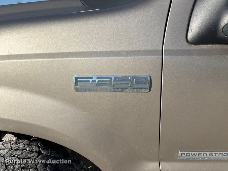 image for item FG0232 2005 Ford F350 Ext. Cab flatbed pickup truck