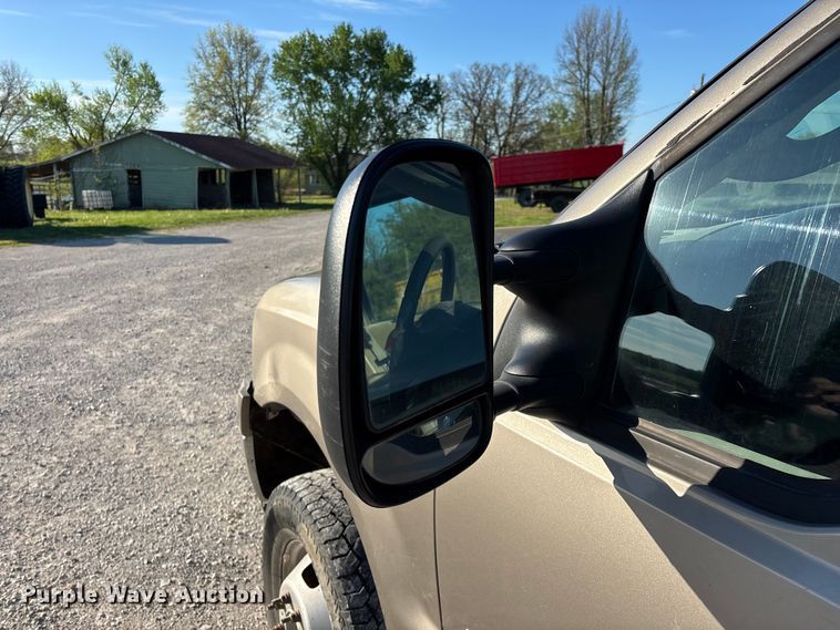 image for item FG0232 2005 Ford F350 Ext. Cab flatbed pickup truck