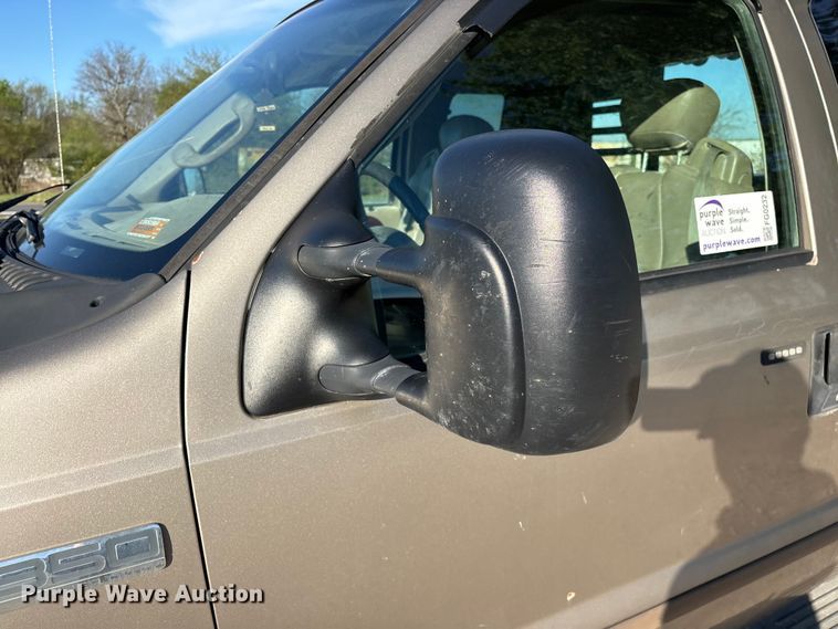 image for item FG0232 2005 Ford F350 Ext. Cab flatbed pickup truck