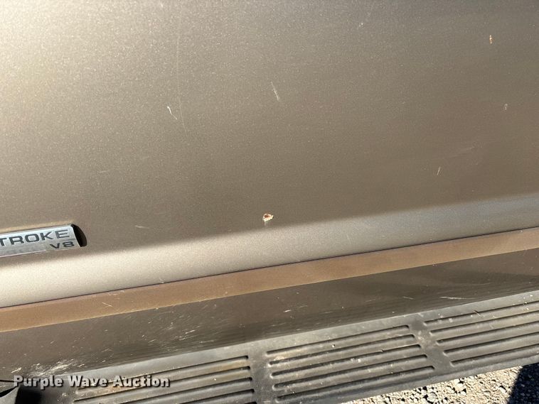 image for item FG0232 2005 Ford F350 Ext. Cab flatbed pickup truck