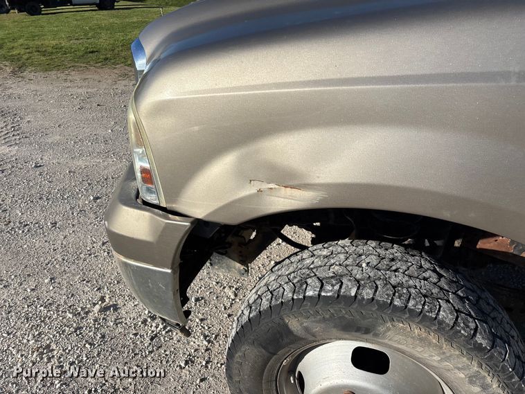 image for item FG0232 2005 Ford F350 Ext. Cab flatbed pickup truck